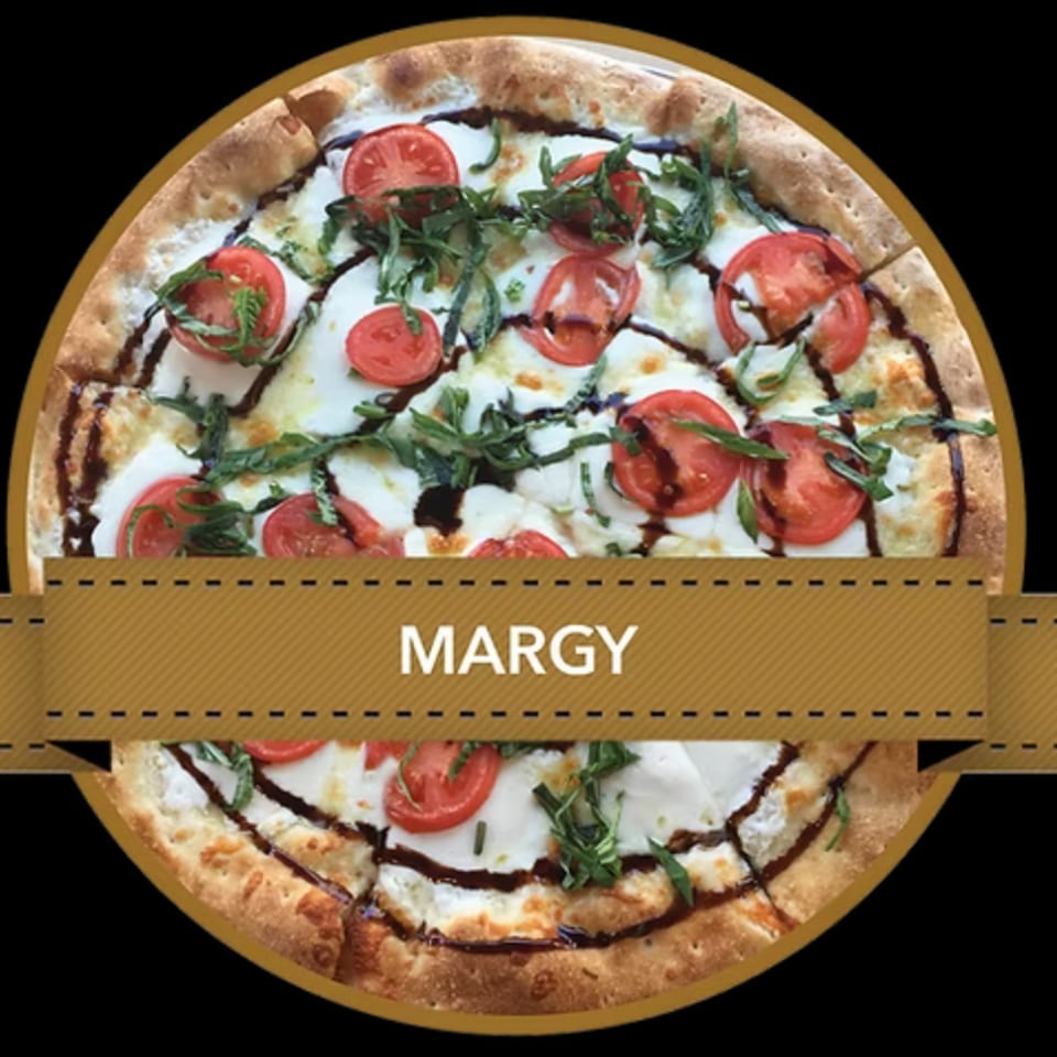 Mikey's Pizza Margy pizza, topped with fresh mozzarella, sliced tomatoes, basil, and balsamic glaze.
